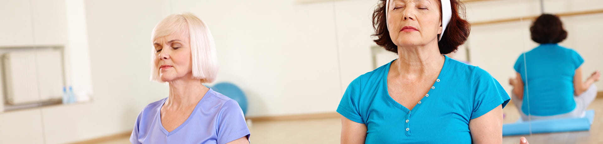 "nurse listening to patients heart"